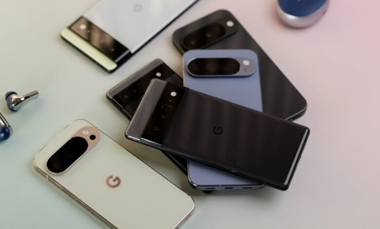 A collection of Google Pixel smartphones and earbuds arranged on a light-colored surface.