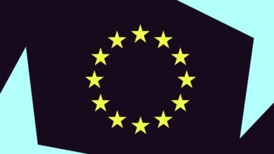 The flag of the European Union with 12 yellow stars in a circle on a dark background.