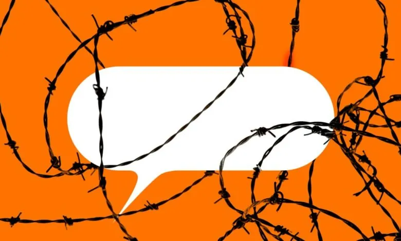 Barbed wire entangled around a white speech bubble on an orange background.