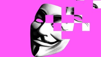 Guy Fawkes mask partially pixelated on a bright pink background.