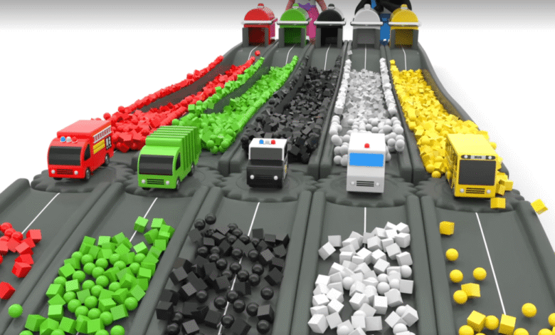 Colorful toy vehicles on a track sorting colored blocks and balls
