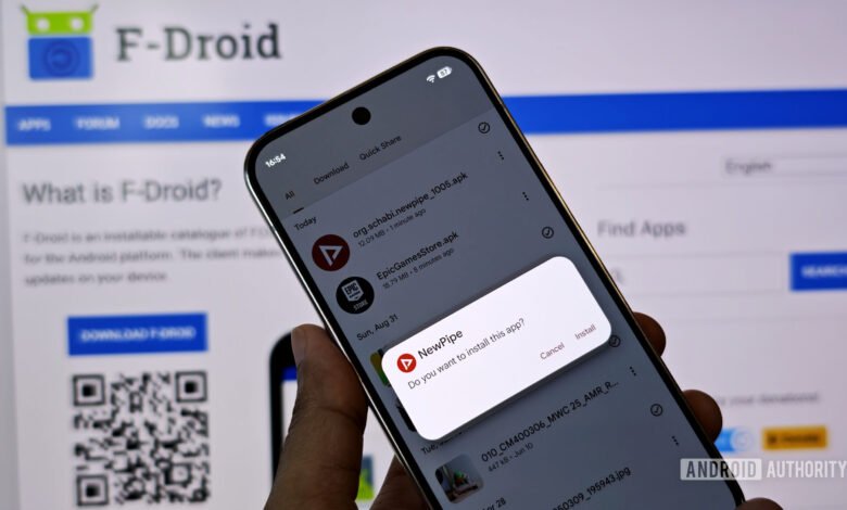 Smartphone displaying a prompt to install the NewPipe app from F-Droid.