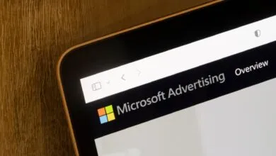 Close-up of a tablet screen displaying the Microsoft Advertising dashboard.