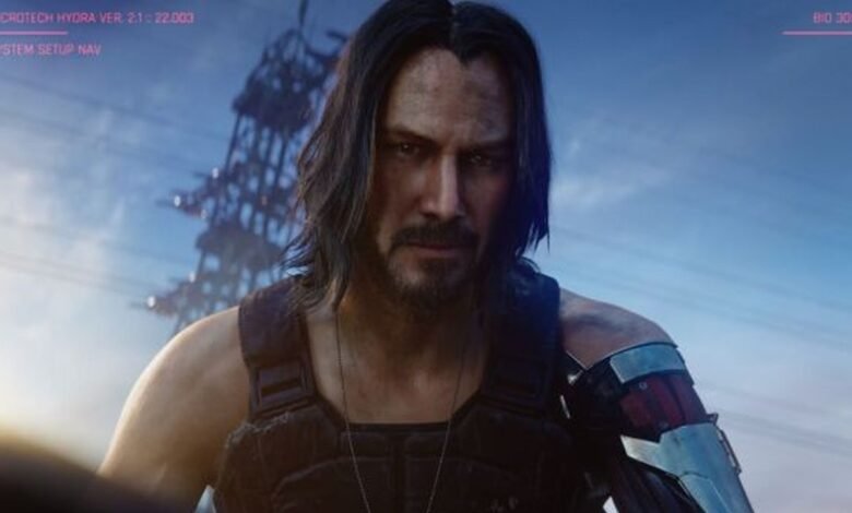 Keanu Reeves as Johnny Silverhand in Cyberpunk 2077, with a cybernetic arm.