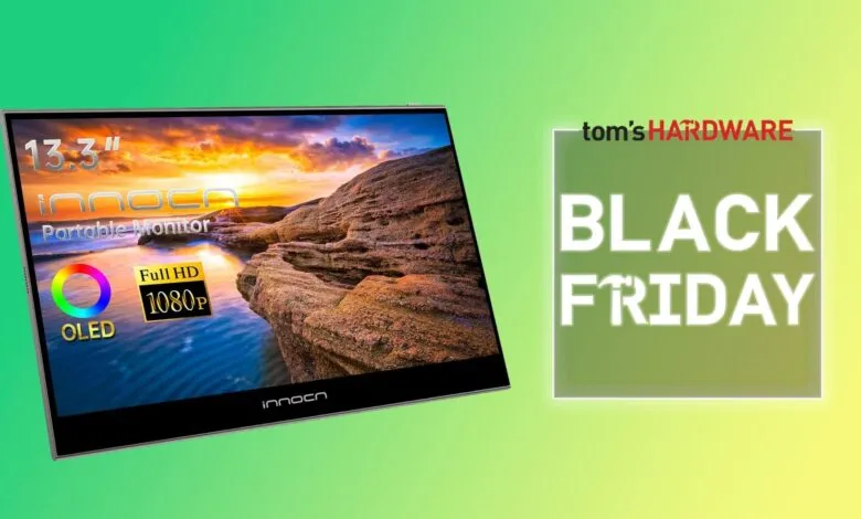 Innocn 13.3" portable monitor displaying a scenic landscape.