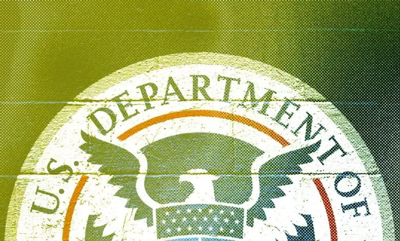 Close-up of the Department of Homeland Security seal with a distressed, textured effect.