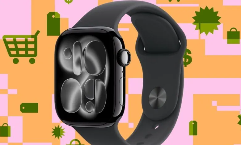 Close-up of a black Apple Watch with a dark gray band against a colorful background.