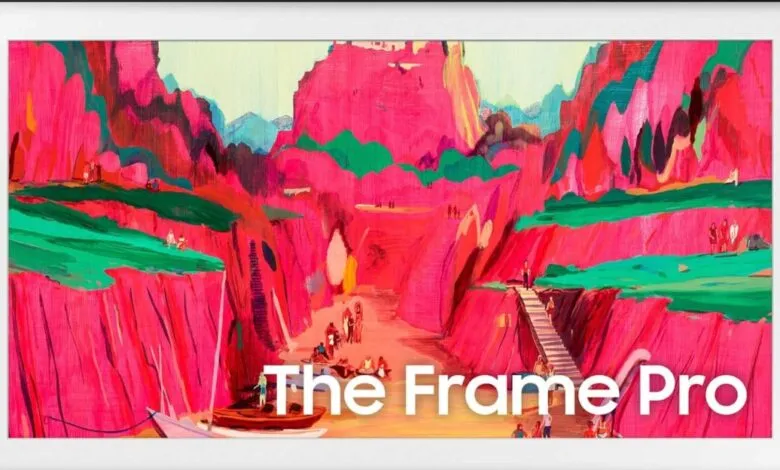 Samsung Frame Pro TV displaying vibrant abstract art of a canyon landscape with figures.
