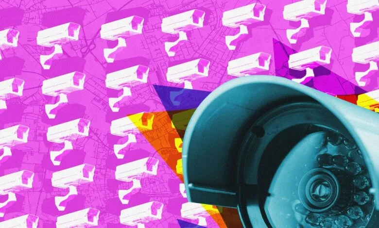 Close-up of a surveillance camera lens with a repeating pattern of security cameras in the background.