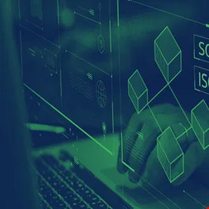 Close-up of hands typing on a laptop with a futuristic digital interface overlay.