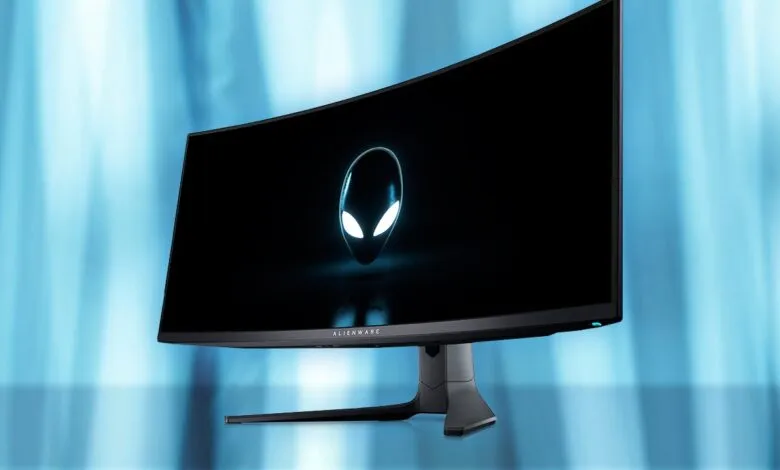 Alienware curved gaming monitor displaying the iconic alien head logo.