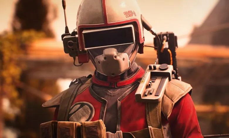 Close-up of a futuristic soldier in red and gray armor with a helmet and visor.
