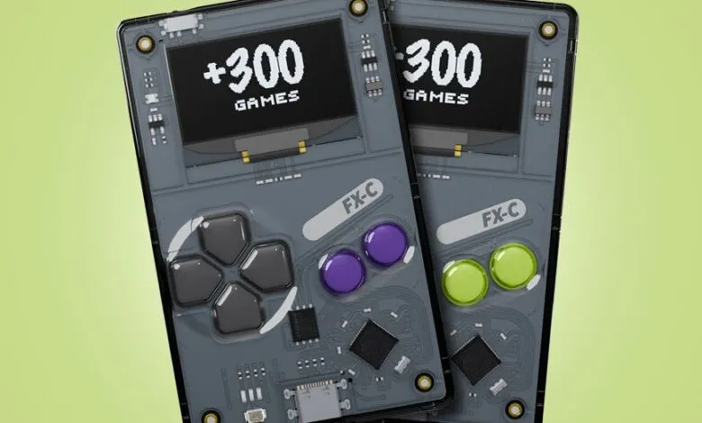 Two grey handheld gaming devices with screens displaying '+300 GAMES'.
