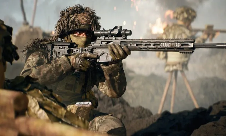 Soldier in camouflage aiming a sniper rifle with scope in a combat zone.