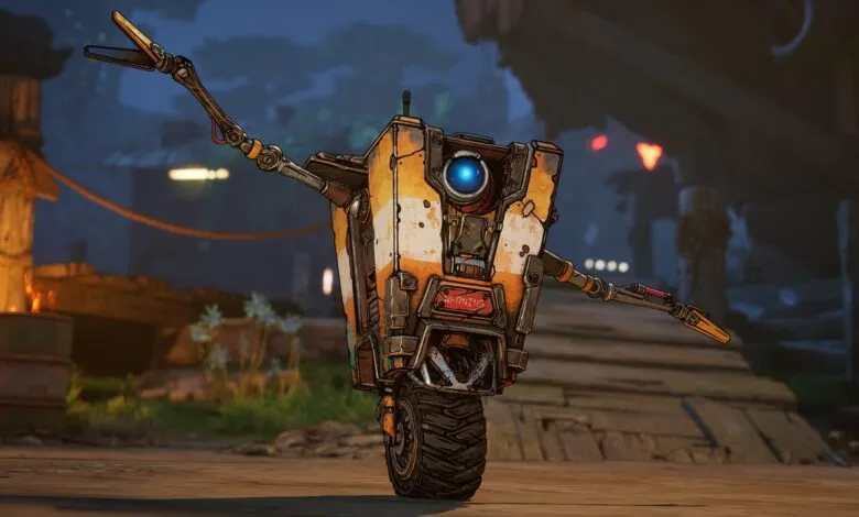 A small, orange and white robot with a blue eye and mechanical arms.