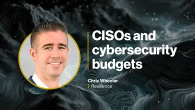 Portrait of Chris Wheeler, discussing CISOs and cybersecurity budgets with a dark, abstract background.