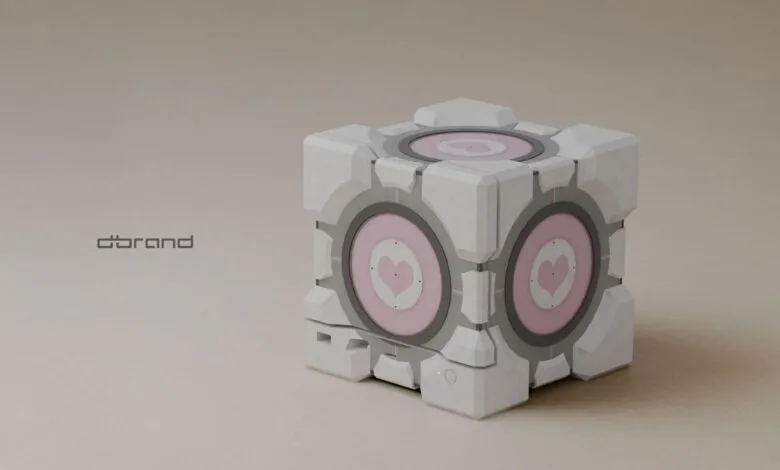 A white and grey cube with pink hearts, resembling a companion cube from Portal.