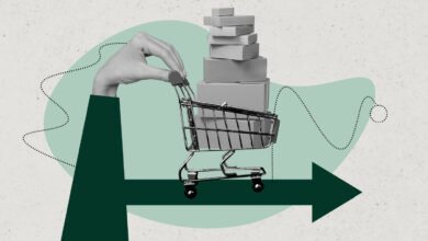 Hand pushing a shopping cart filled with boxes, with a graph and arrow indicating trends.