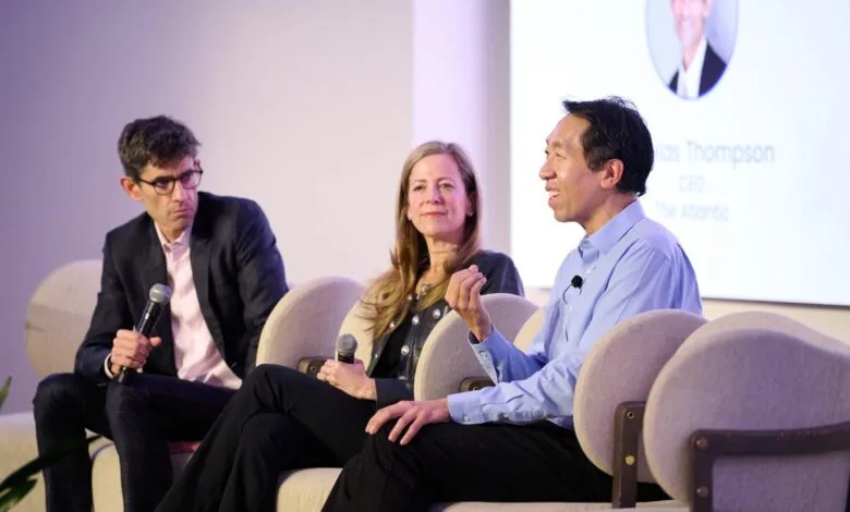 Three people on a panel, two men and one woman, seated and speaking.