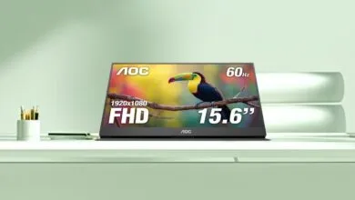 AOC 15.6 inch FHD portable monitor displaying a colorful toucan on a branch.