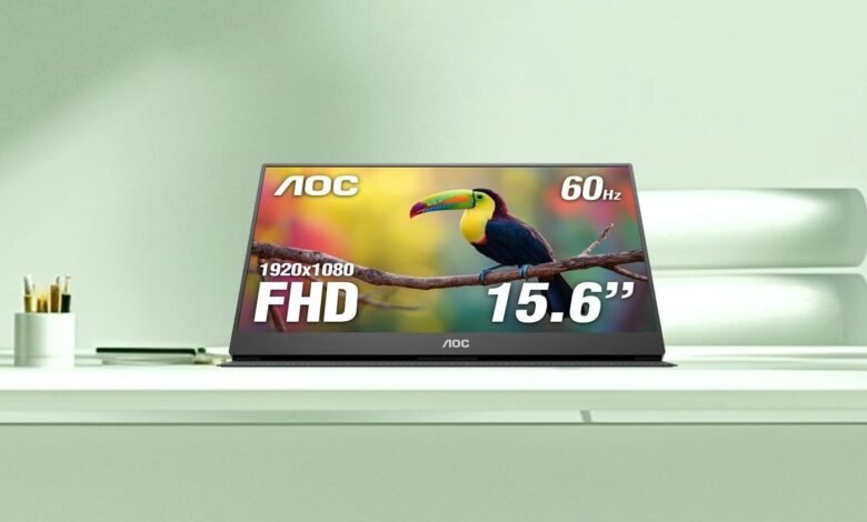 AOC 15.6 inch FHD portable monitor displaying a colorful toucan on a branch.