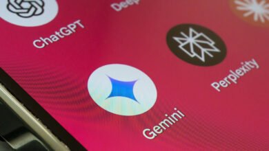 Close-up of a smartphone screen displaying AI app icons including Gemini, ChatGPT, and Perplexity.