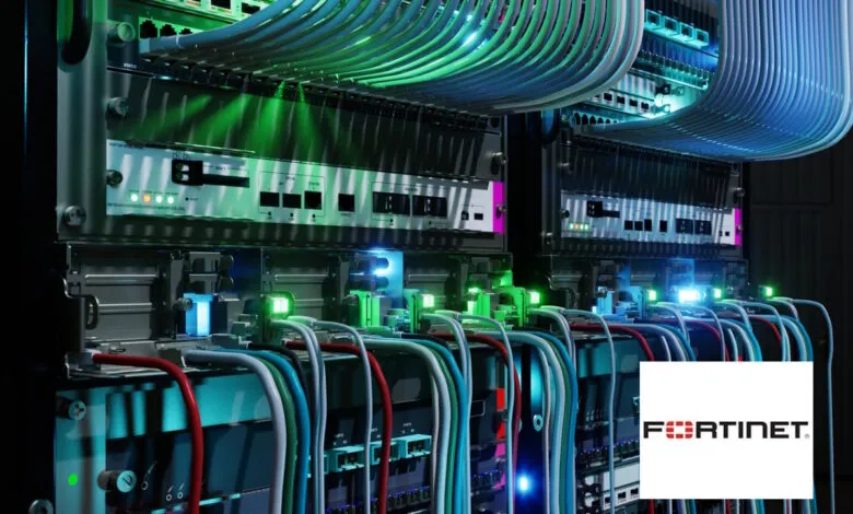 Close-up of a server rack with colorful cables and glowing indicator lights.