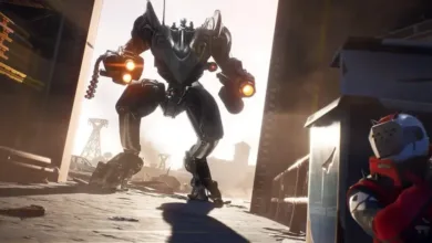 Large gray robot with glowing weapons stands over a character in red armor.