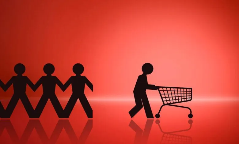 Silhouettes of people holding hands and one person pushing a shopping cart against a red background.