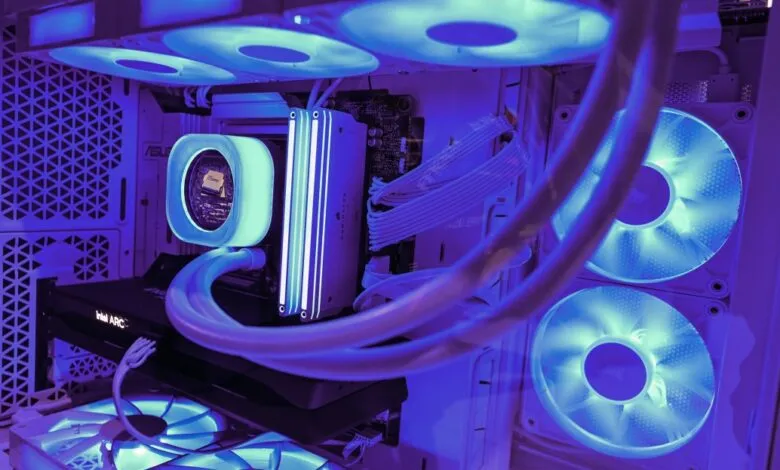 Inside a custom-built PC with blue LED cooling fans and components.