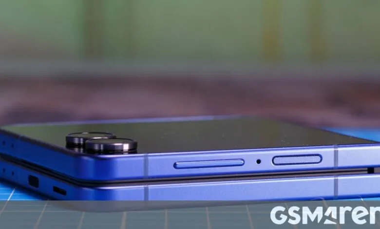 Close-up of a closed blue foldable smartphone with camera lenses visible.