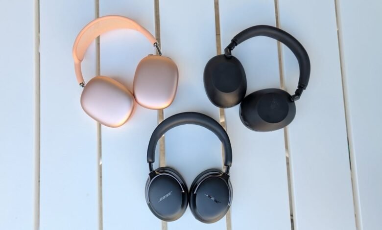 Three pairs of headphones: pink Apple AirPods Max, black Sony, and black Bose.