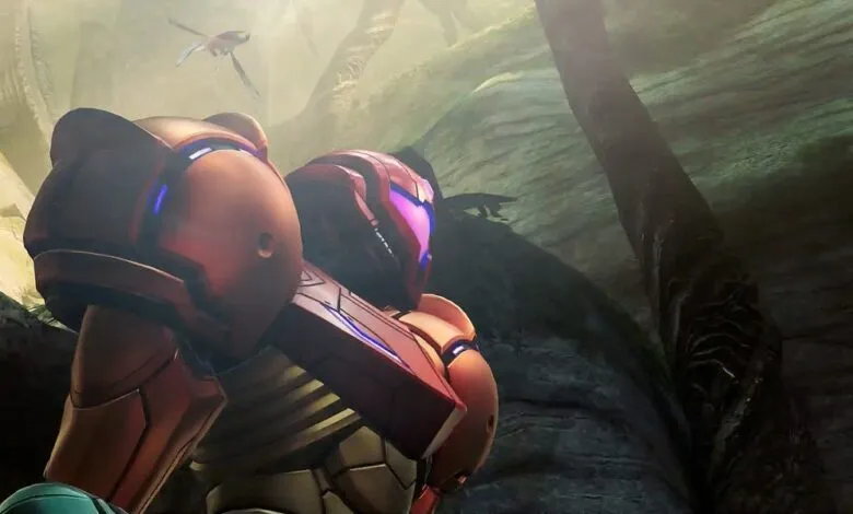 Samus Aran in her orange Power Suit looks out over a lush, alien jungle.