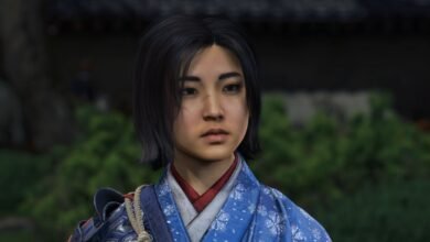 Close-up of a young woman with dark hair, wearing traditional Japanese attire.