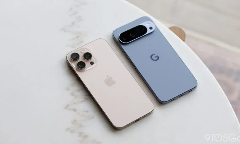 iPhone and Pixel phones side-by-side on a white marble table.