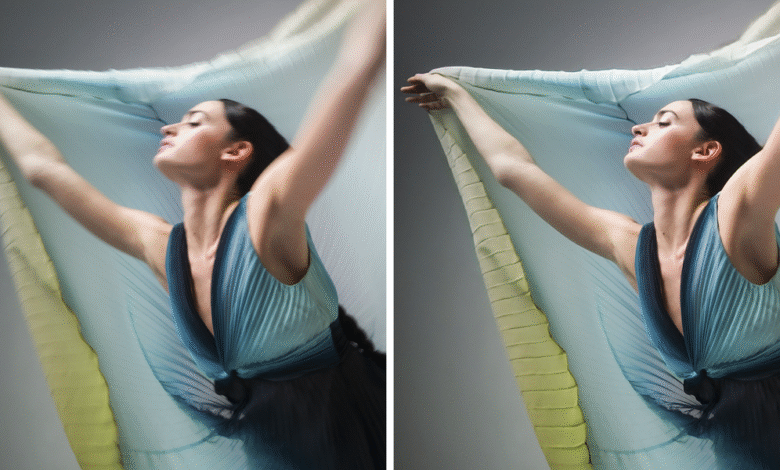 Woman in flowing dress with fabric overhead, arms raised.