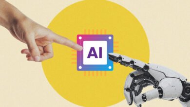 Human and robot hands reach for an AI chip, symbolizing human-AI interaction.