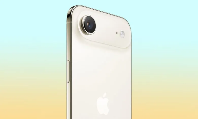Close-up of a white iPhone with camera lens visible.