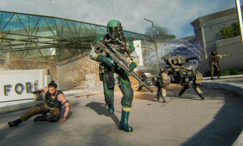 Soldiers in futuristic gear engage in combat with a robotic turret and a downed comrade.