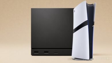 A black PlayStation 5 console next to a white PlayStation 5 console.