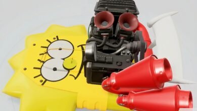 Spongebob-themed vehicle with engine, horns, and spoiler on a white background.