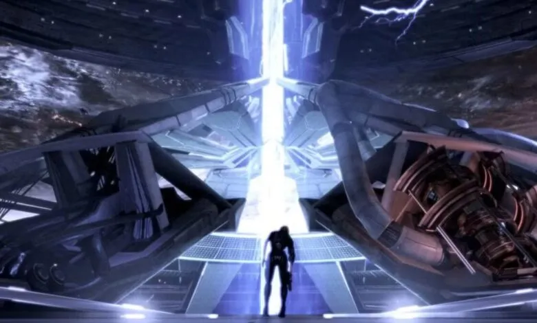 A lone figure stands before a massive, glowing energy conduit in a futuristic chamber.