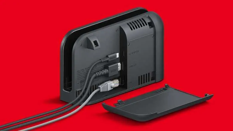 Back view of a black Nintendo Switch dock with cables connected.