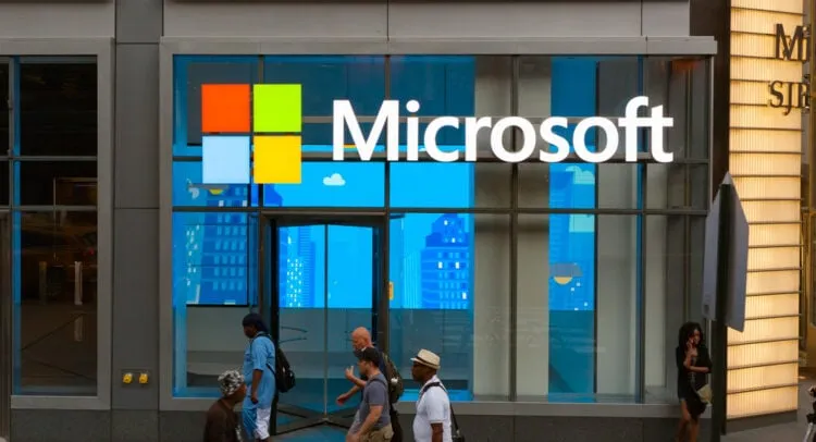 Microsoft store exterior with logo and people walking by