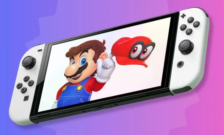 Nintendo Switch OLED with Super Mario Odyssey displayed on the screen.