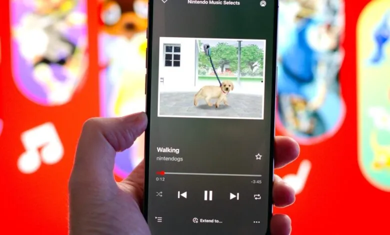 Smartphone displaying the Nintendo Music app with a Nintendogs track playing.