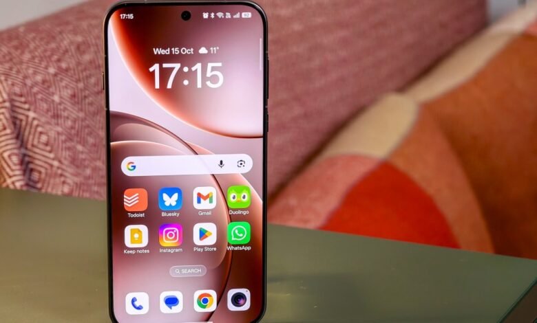 Close-up of a modern smartphone displaying its home screen with various app icons.