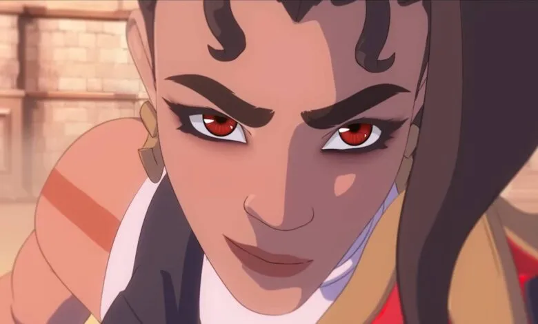 Close-up of a determined female character with striking red eyes and dark hair.