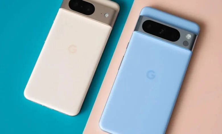 Two Google Pixel smartphones, one cream and one light blue, with camera bars.