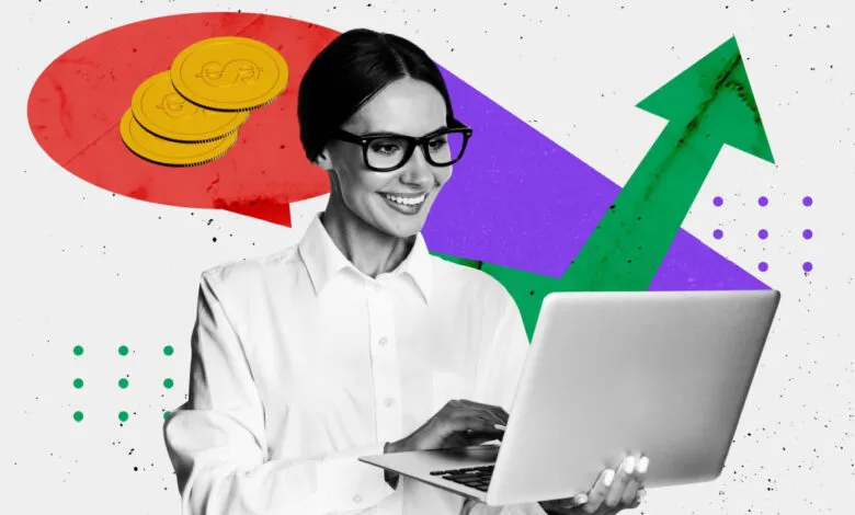 Woman in glasses smiling while working on a laptop with abstract graphics of coins and growth charts.